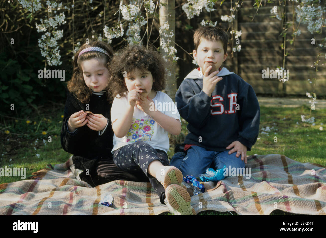 children eating easter eggs Stock Photo Alamy