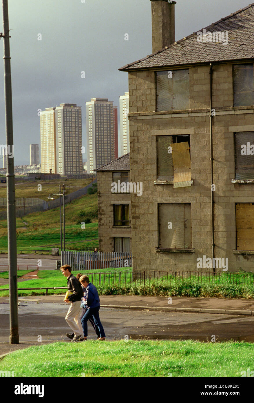 High rise estate buildings overlook a run down housing project in