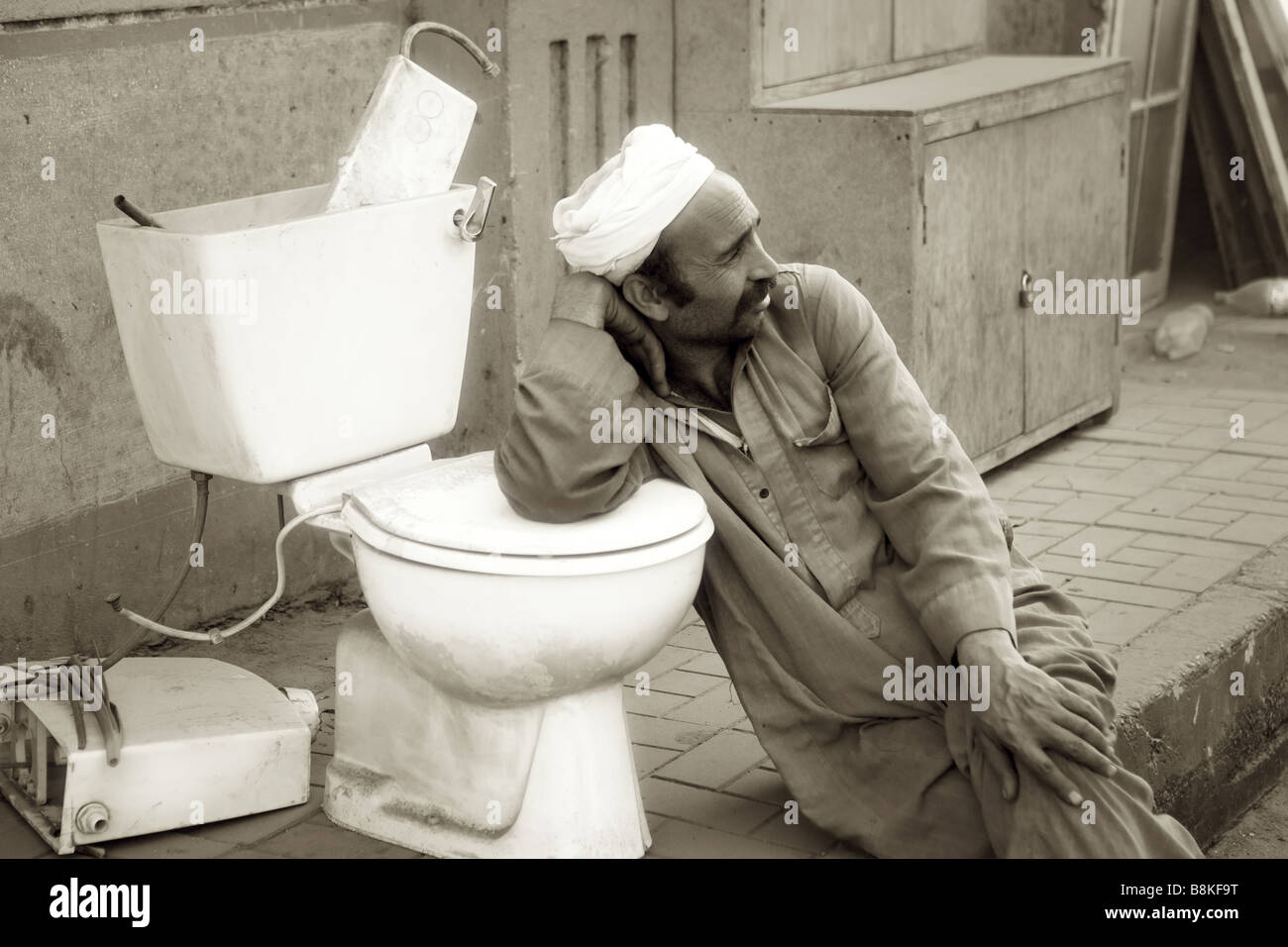 Man Sitting On Toilet Seat Stock Photos Man Sitting On Toilet