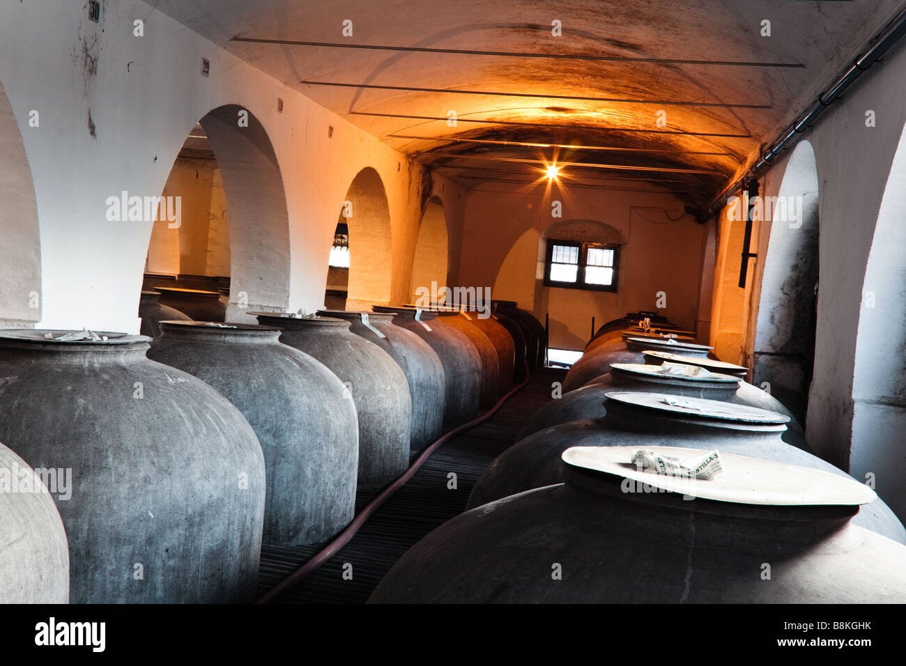 Montilla Cordoba Province Spain Interior Bodegas Navarro showing tinajas or earthenware jars in which wine ferments Stock Photo
