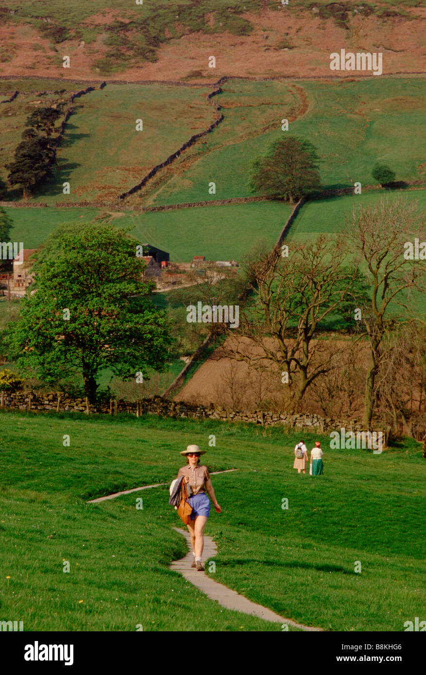 Botton Village for people with learning disabilities, North Yorkshire England. People walk back