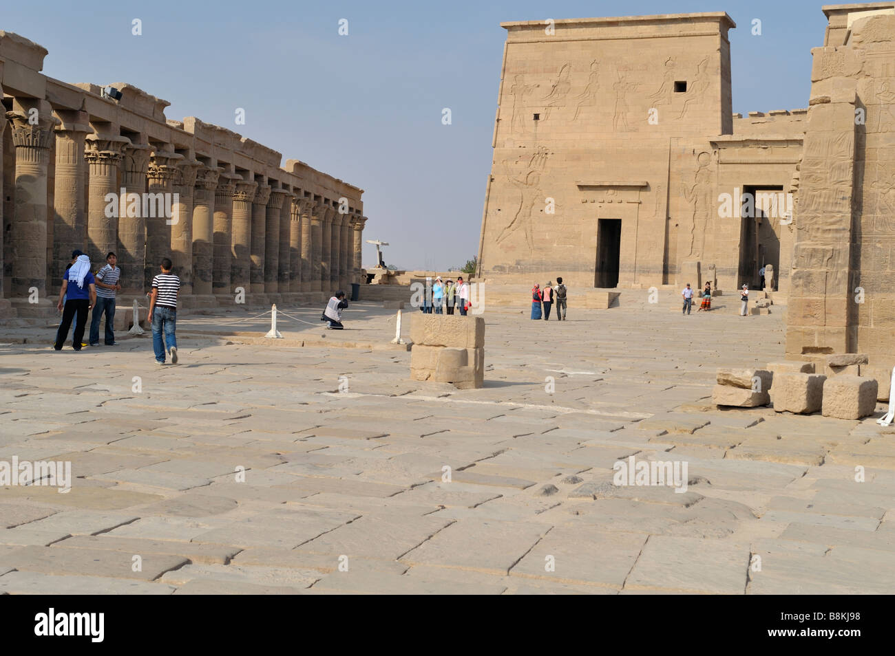 Western Colonnade and first pylon, Temple of Isis, New Philae Island, Aswan, Egypt 081121 33269 Stock Photo