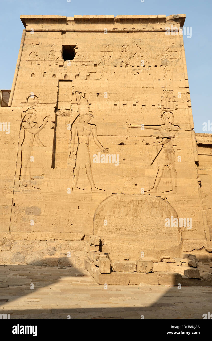 Isis and Horus and sacred boulder, second Pylon, Temple of Isis, New Philae island, Aswan, Egypt 081121 33286 Stock Photo