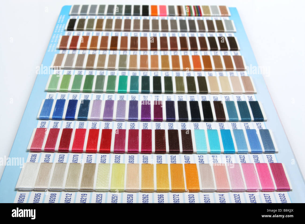 Colorful thread samples Stock Photo - Alamy