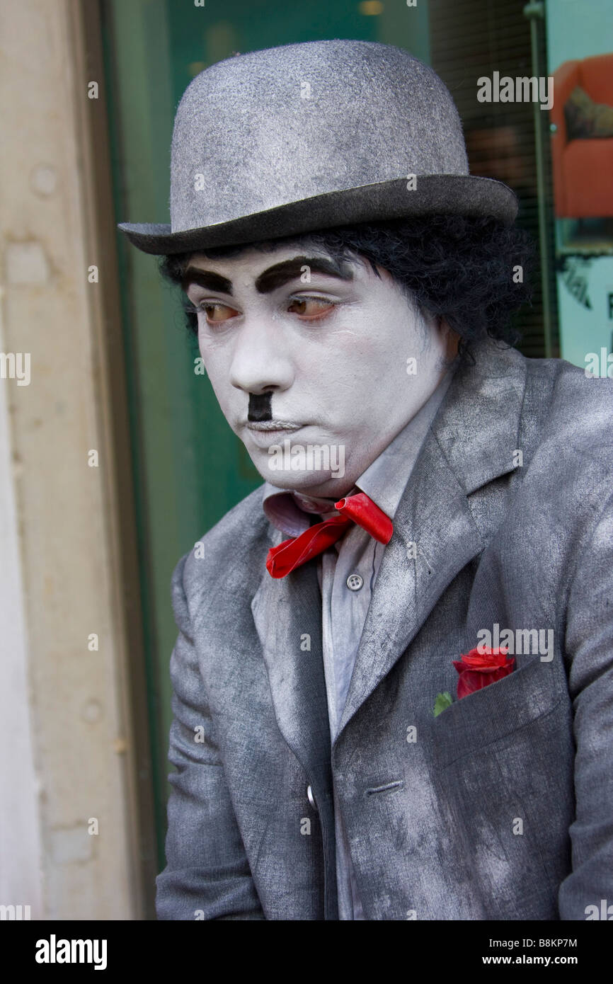 Carnival closeup face of charlie chaplin white face grey Costume & bowler  hat, 90526-Venice Stock Photo - Alamy