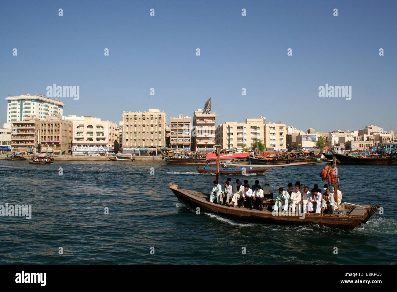 Traditional Abra Ferry Crossing Dubai Creek  in Dubai in the UAE Stock Photo