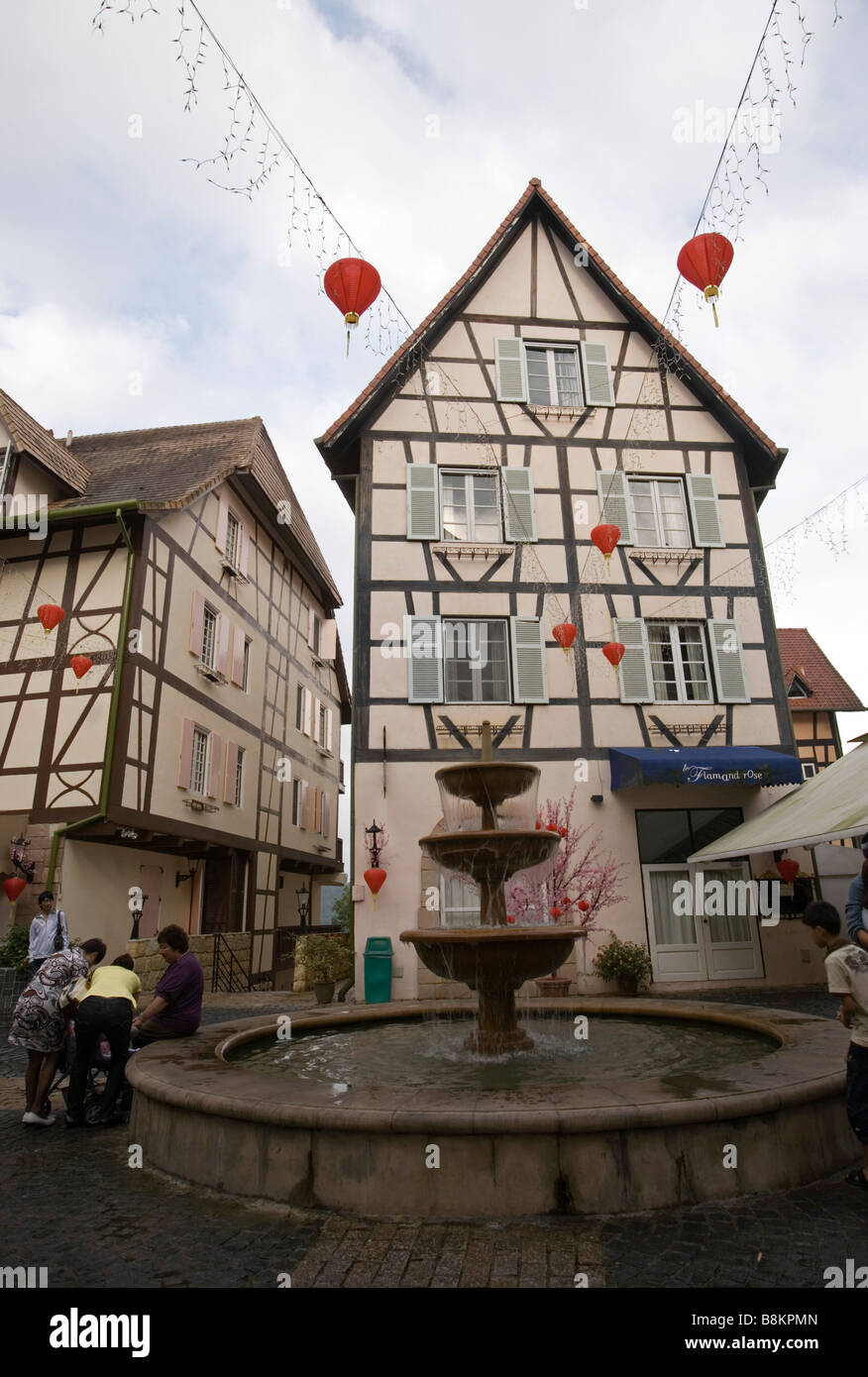 French-themed village with a fountain Stock Photo