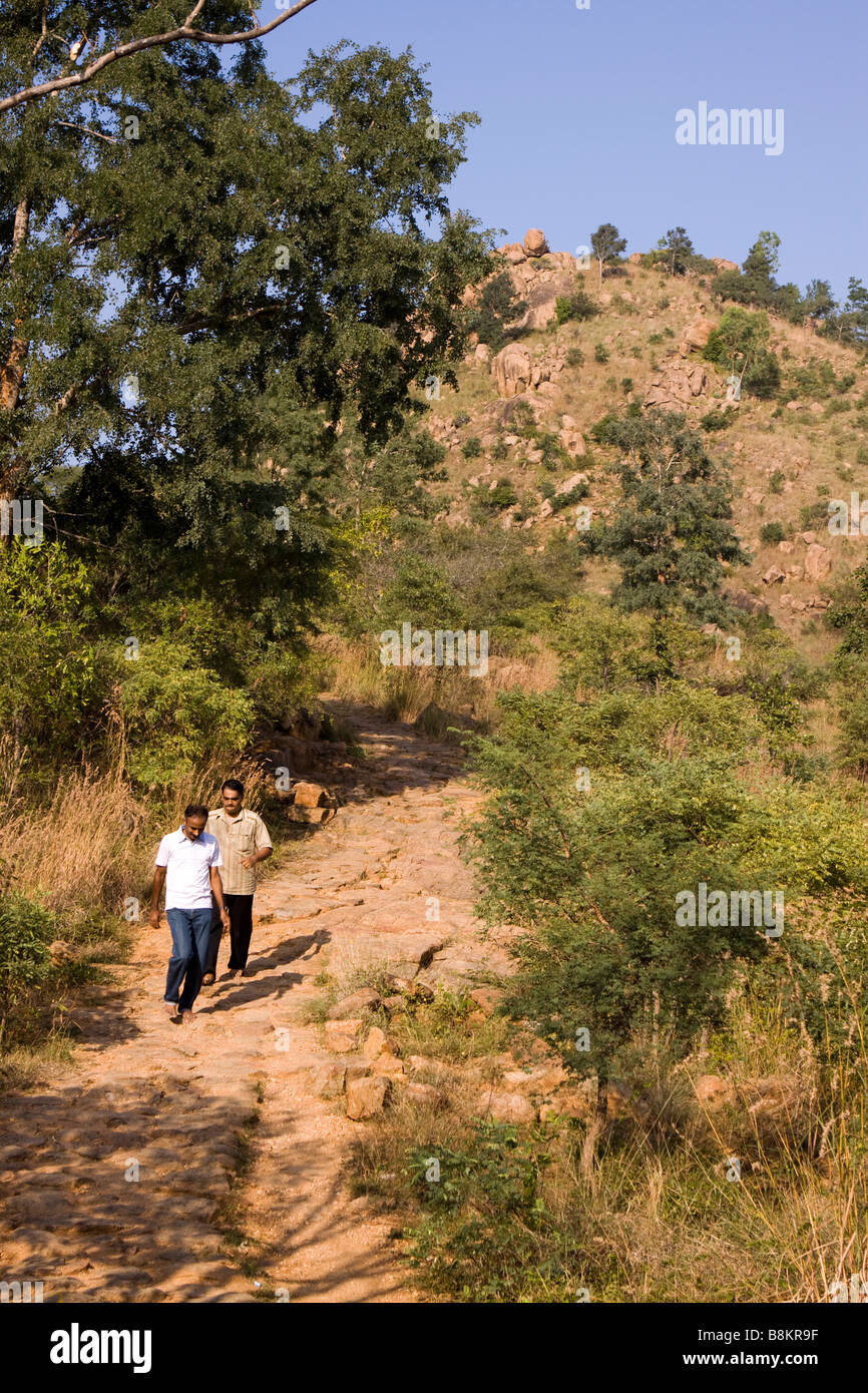India Tamil Nadu Tiruvannamalai pilgrims walking on path up to Mount Arunachaleswar shrine Stock Photo