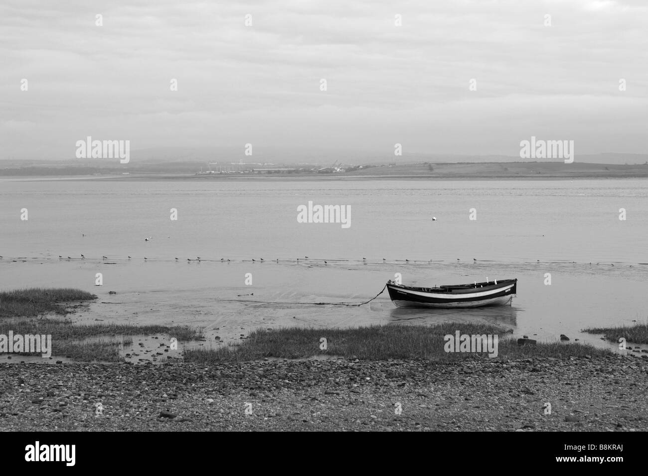 Boat at Sunderland Point, a small hamlet near Heysham, Lancashire, UK.  It dates back to the cotton trade of the 18th century. Stock Photo