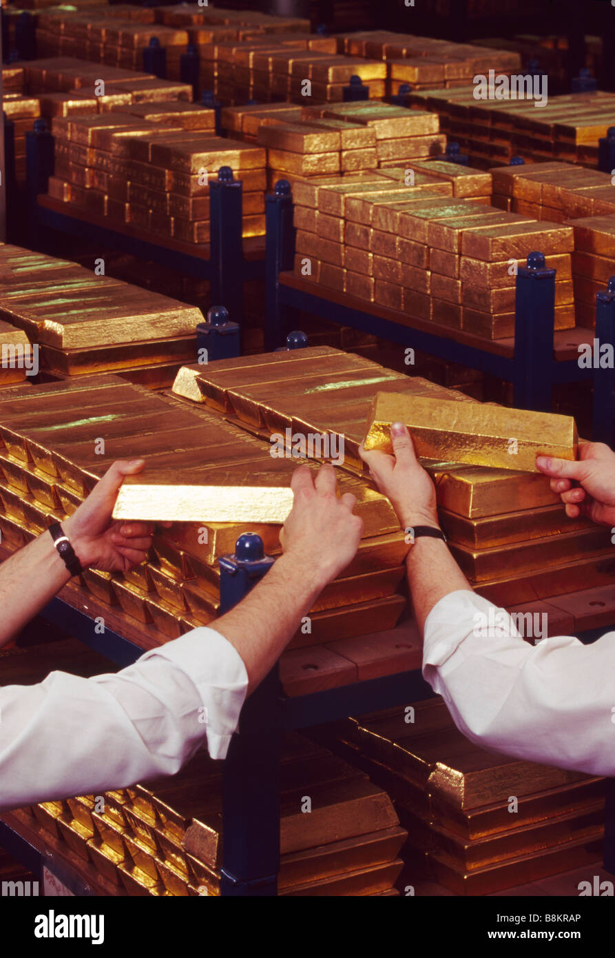The Bank of England underground Gold Vaults in London Stacks of Gold Bars are arranged on storage shelves Stock Photo