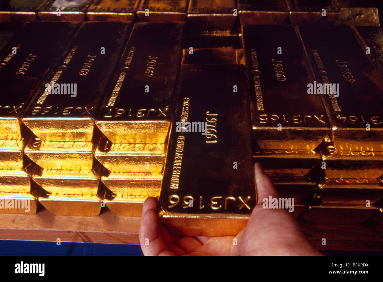The Bank of England underground Gold Vaults in London Stacks of Gold Bars are arranged on storage shelves Stock Photo