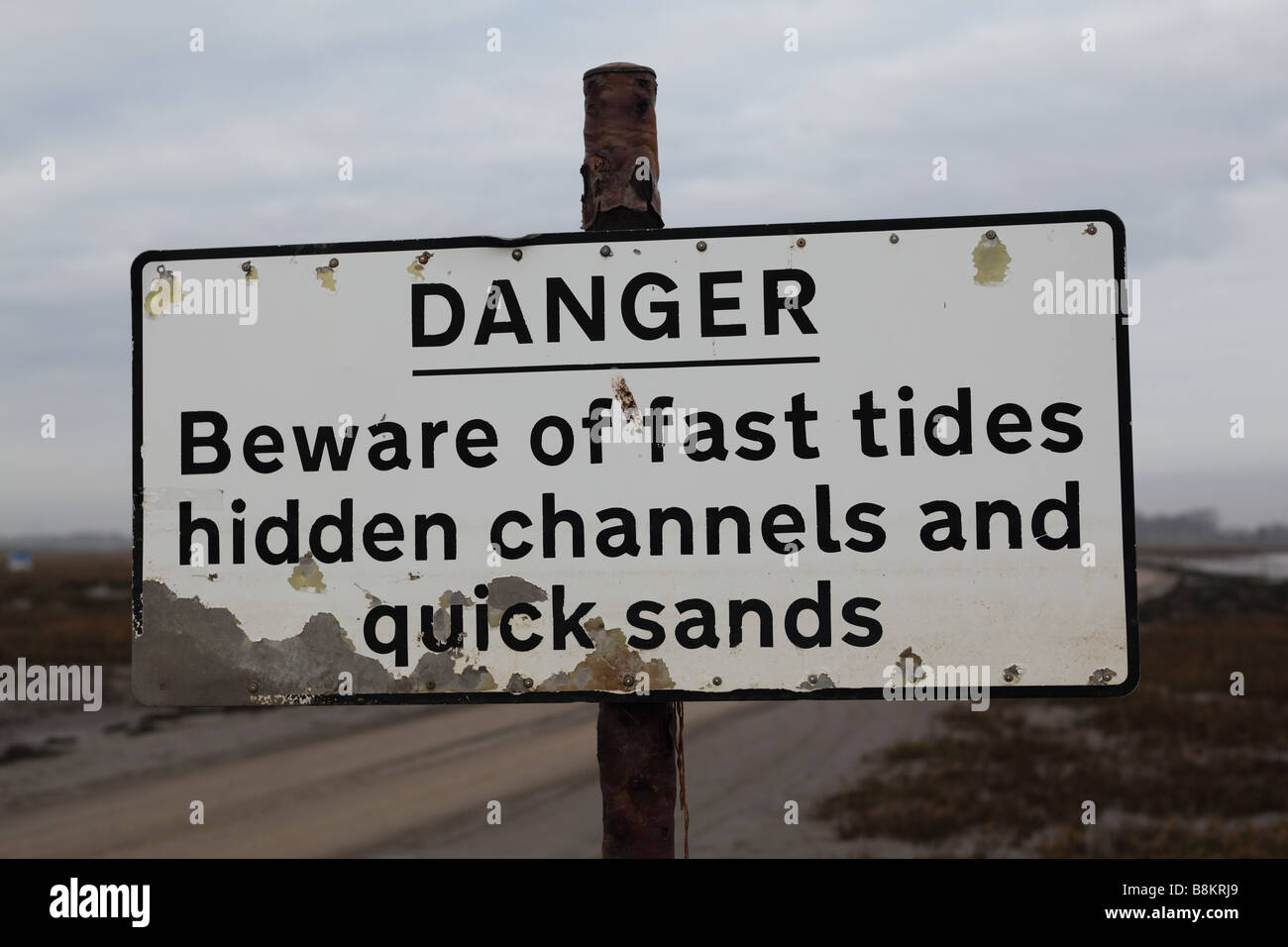 Signpost on the road to Sunderland Point, Morecambe Bay, Lancashire, UK. The road is submerged