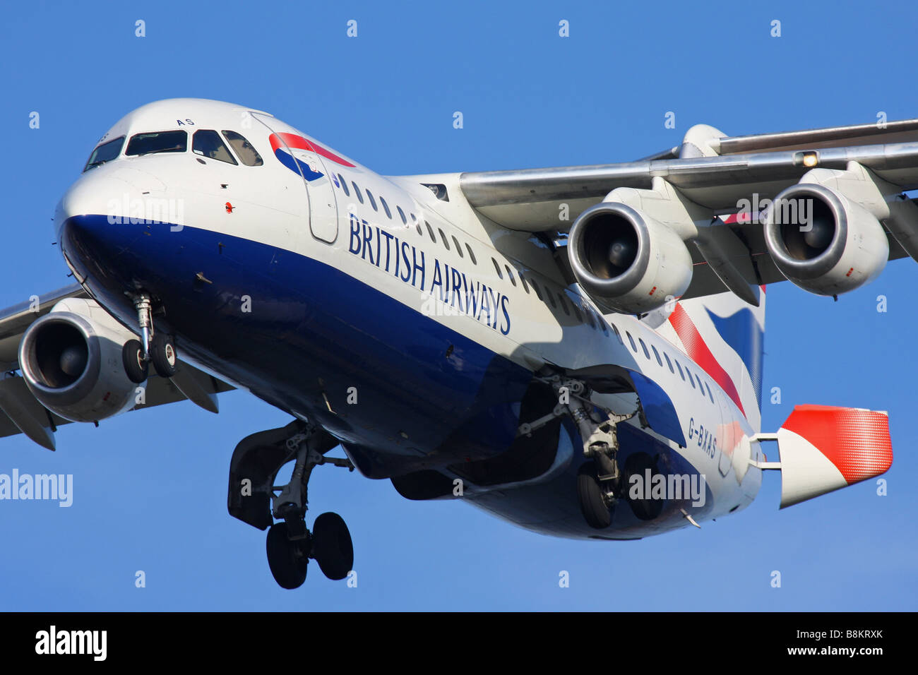 Avro jet of British Airways landing on London City Airport Stock Photo