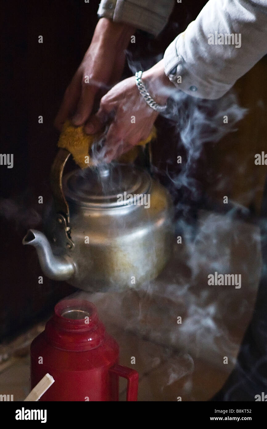 making tea with kettle Stock Photo Alamy