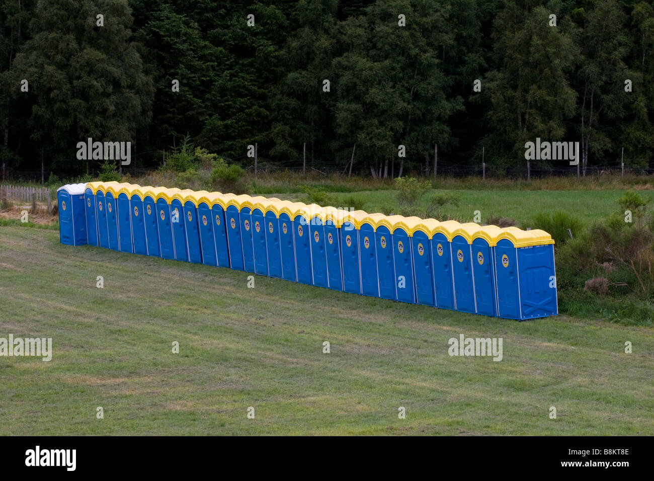 or port-a-loo or mobile Toilet Cubicles in a row Stock Photo