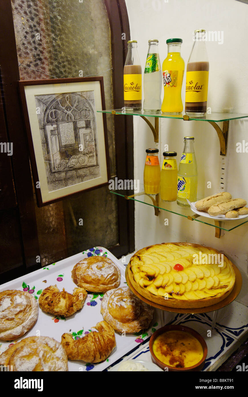 Cakes in old fashioned bakery in the gothic district Barri Gotic of Barcelona Spain Stock Photo