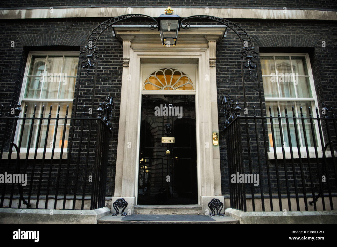 A wide shot of the front of number ten Downing Street, the residence of the British Prime Minister in London, UK. Stock Photo