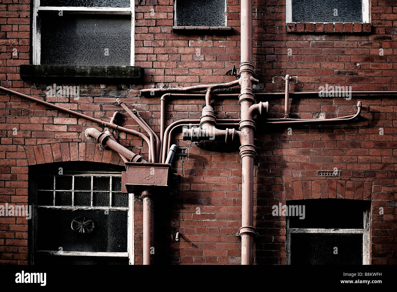 drain pipes and guttering coming from an old victorian building Stock