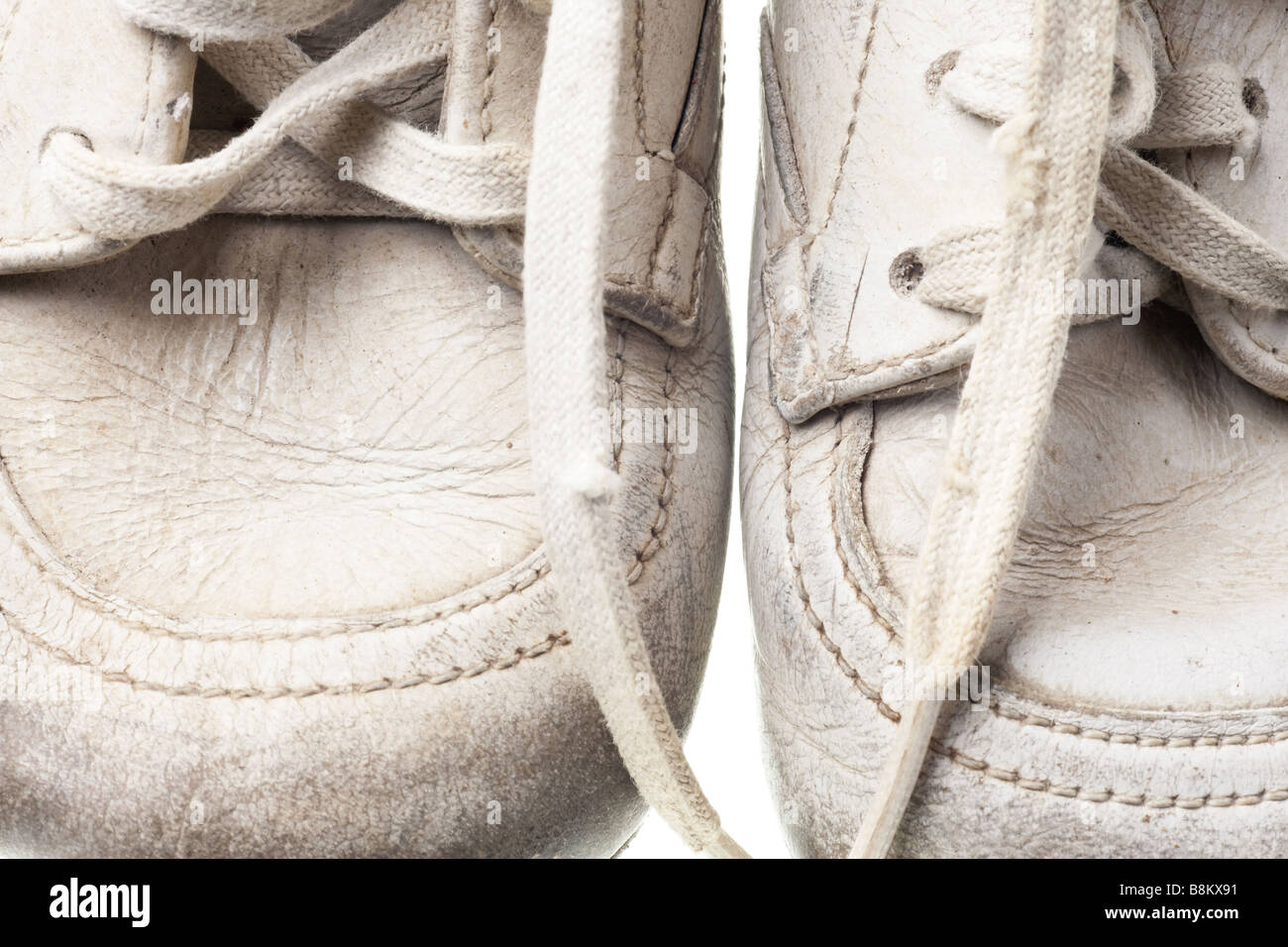 old baby shoes isolated on white background Stock Photo - Alamy