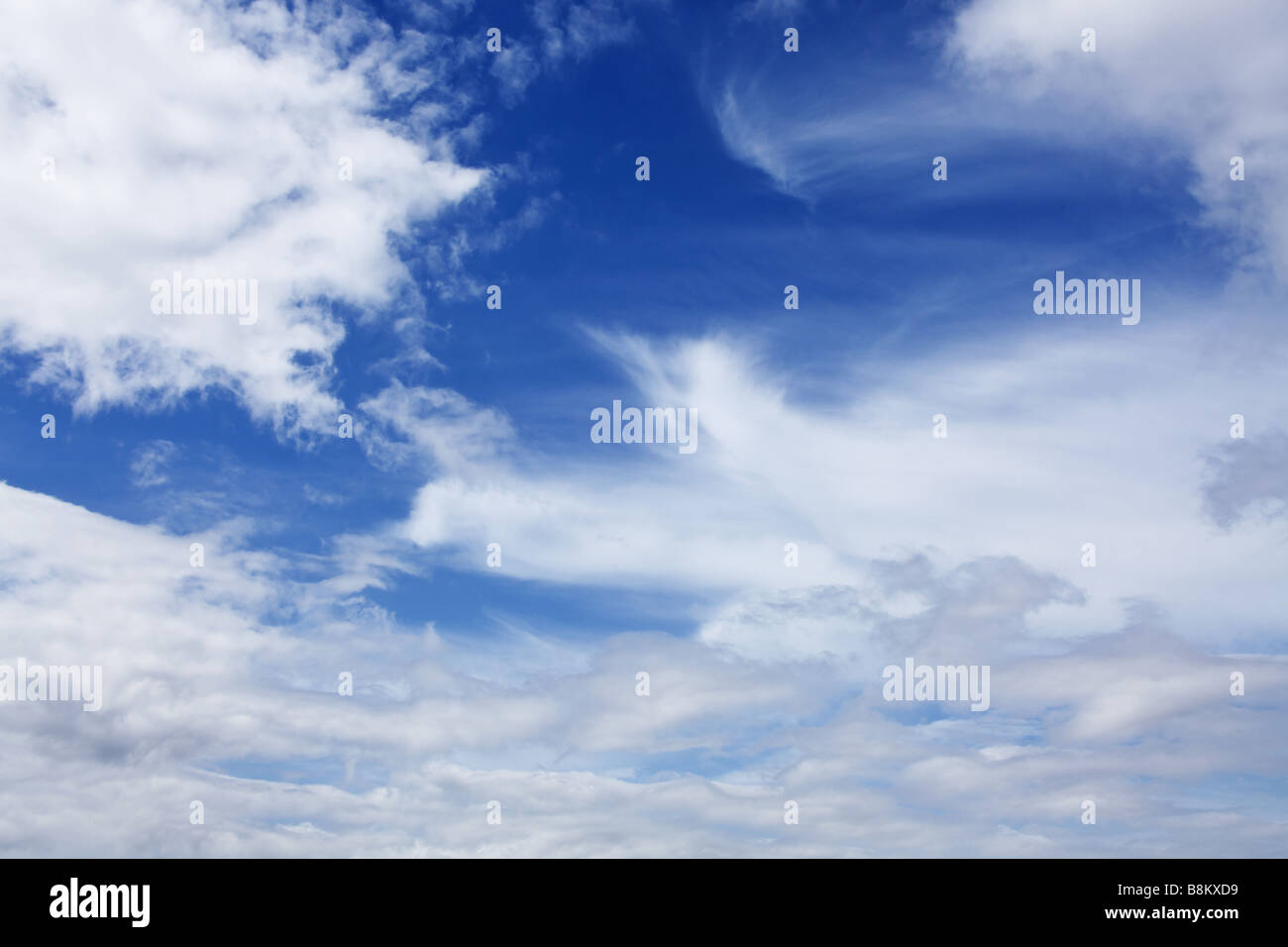 blue sky with white fluffy clouds background Stock Photo - Alamy