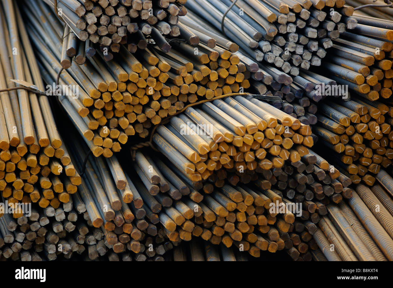 Steel, iron and metal rods and pipes at a construction site for concrete and cement work, waiting for industrial project. Stock Photo