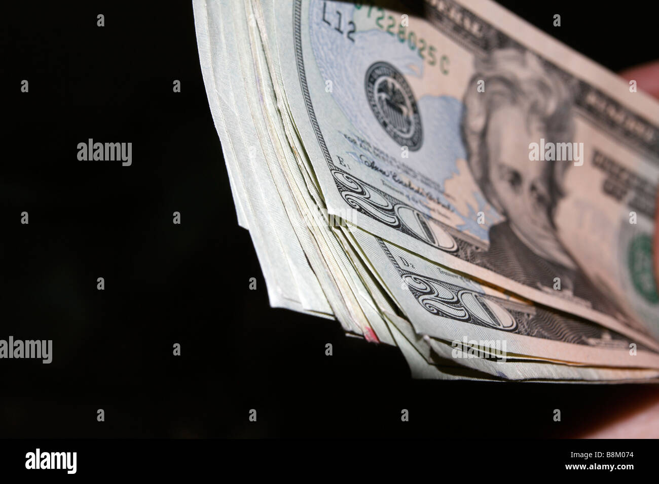 Flat USA twenty dollar bills on black Stock Photo Alamy