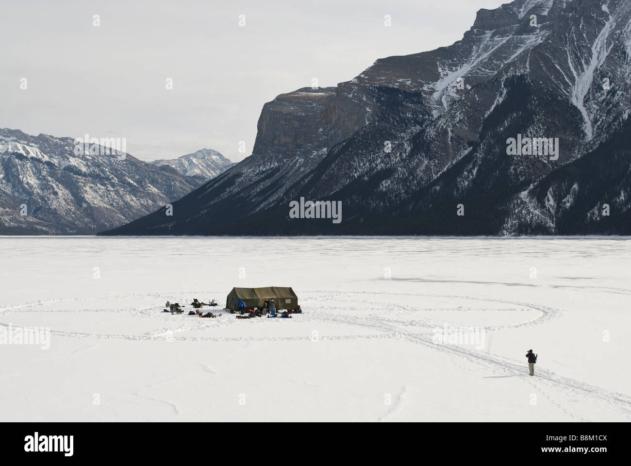 Ice diving tent on a frozen Lake Minnewanka, Banff National Park, Alberta, Canada. Stock Photo