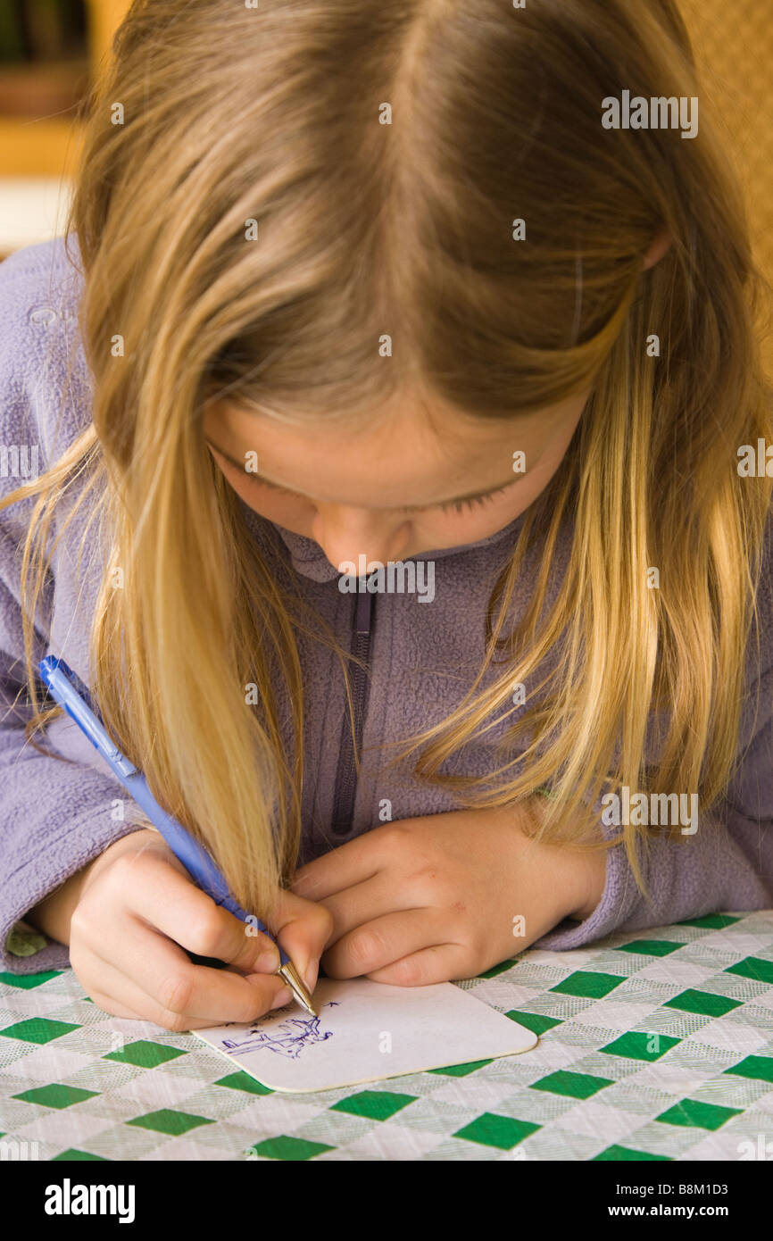 Eight Year Old Girl Drawing High Resolution Stock Photography and ...