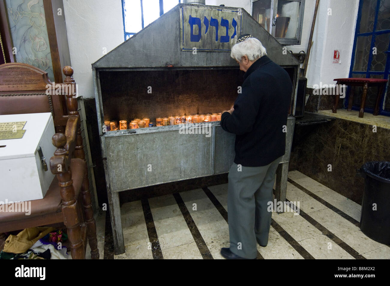 Rashbi Grave-Man Lights Candles Stock Photo