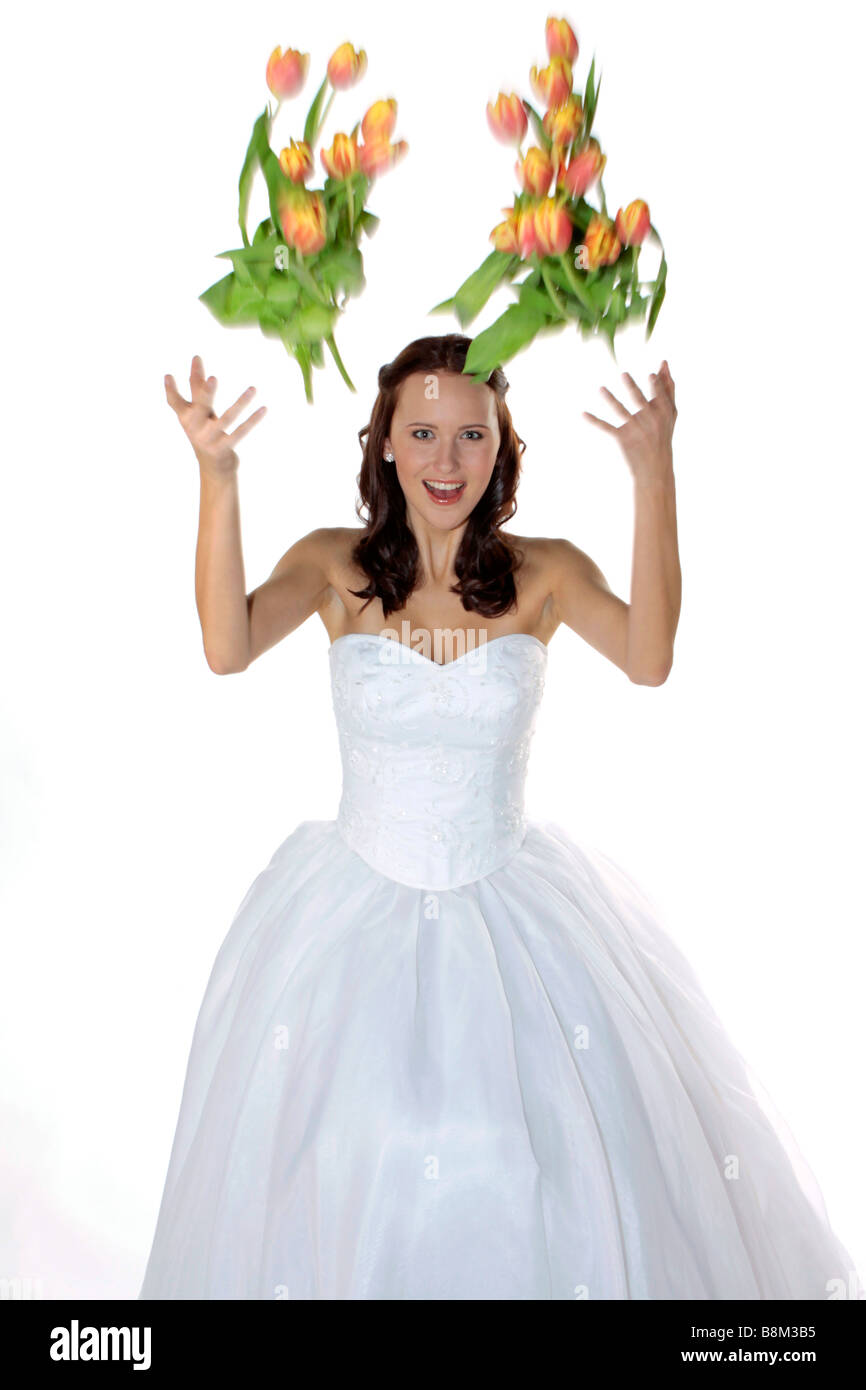 bride in wedding dress bridal bouquet throwing Stock Photo Alamy