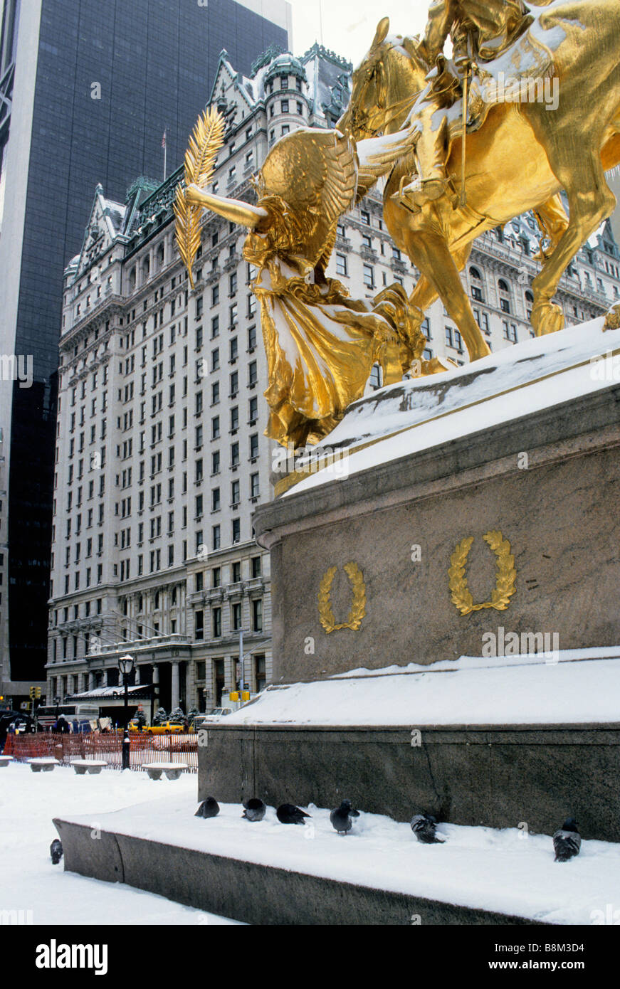 The Plaza Hotel,  New York City, 5th Avenue. General George Tecumseh Sherman equestrian monument on the Grand Army Plaza. New York winter snow scene Stock Photo