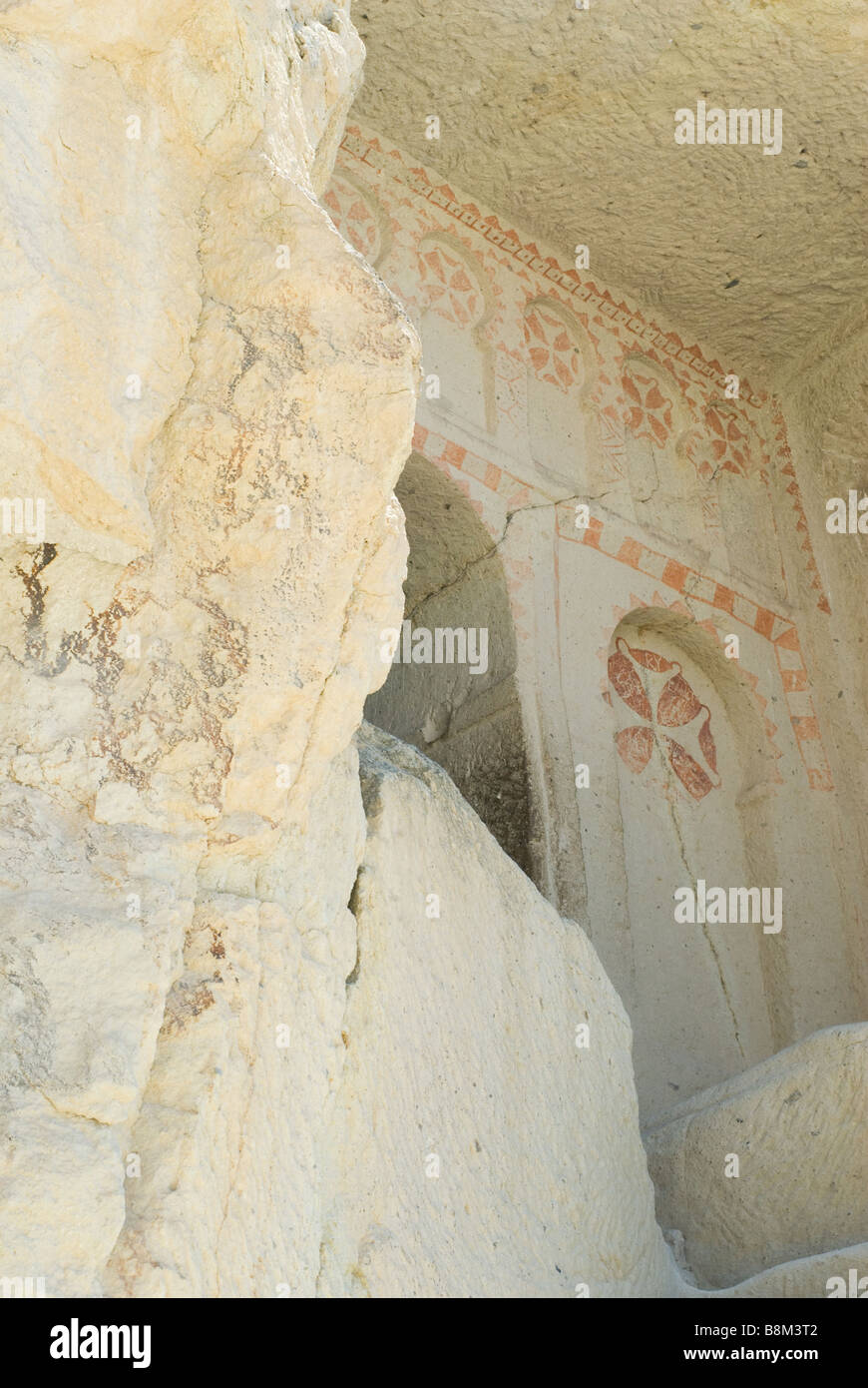 Cappadocia, Goereme open air museum, ancient Christian cave, doorway, depiction of a red cross, Turkey Stock Photo