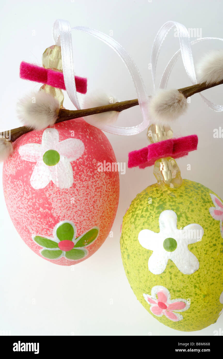 easter eggs hanging on willow planches Stock Photo