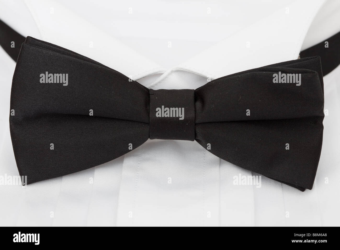 close up of a black tie and shirt collar Stock Photo