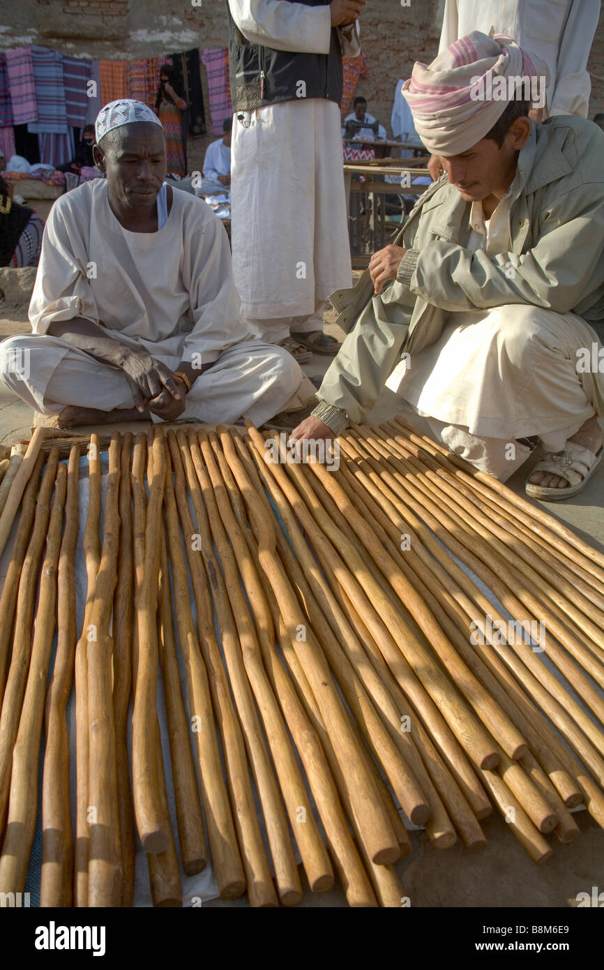 Rashaida man selling walking sticks at the market in Kassala at Erythrean border, East Sudan Stock Photo