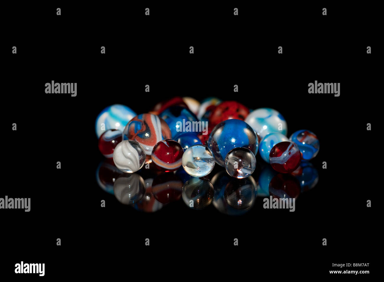 Group of marbles made of glass with swirls and various colors Stock Photo