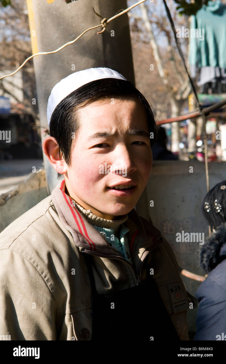 Portrait of a young  Chinese Muslim man. Stock Photo