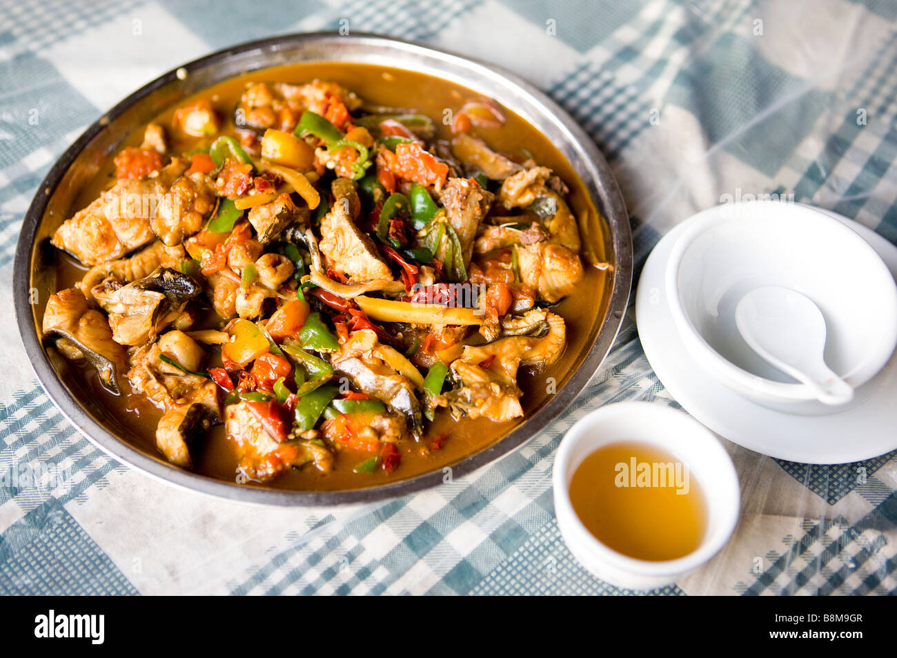 China Guangxi Province Guilin Yangshuo beer fish and stewed pork on the