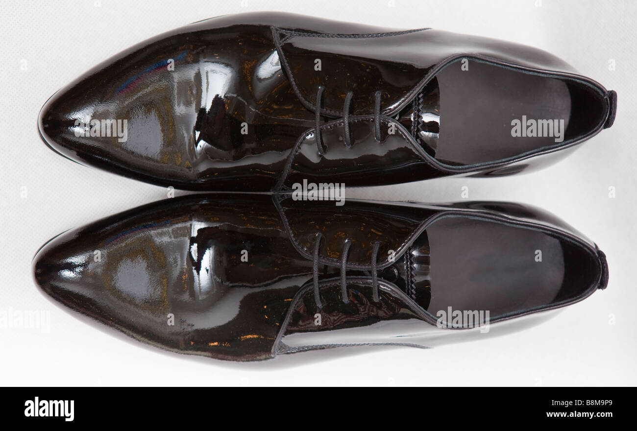 men’s patent-leather shoes on white Stock Photo - Alamy