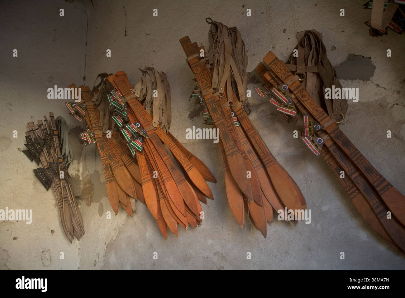 Rashaida arabic nomads swords on the wall in the shop in Kassala at Erythrean border in Sudan Stock Photo