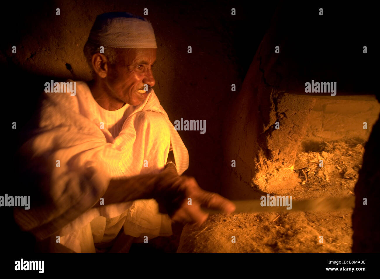 Bread baking in El Ar village at 4th Nile River catharact region Nubia Sudan Stock Photo