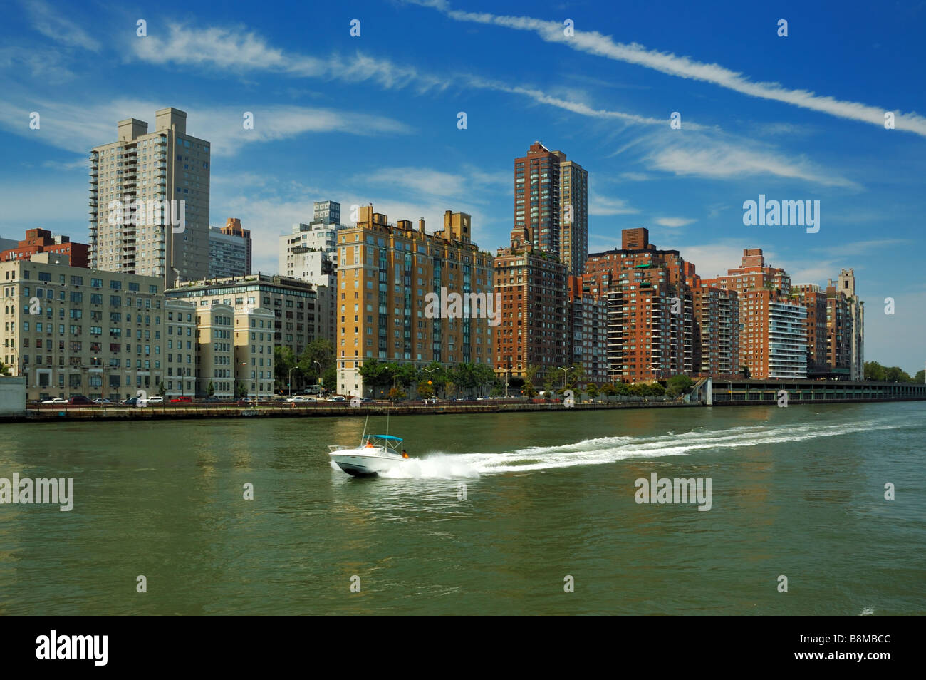 Apartment buildings line the shore of the East Hudson River at the