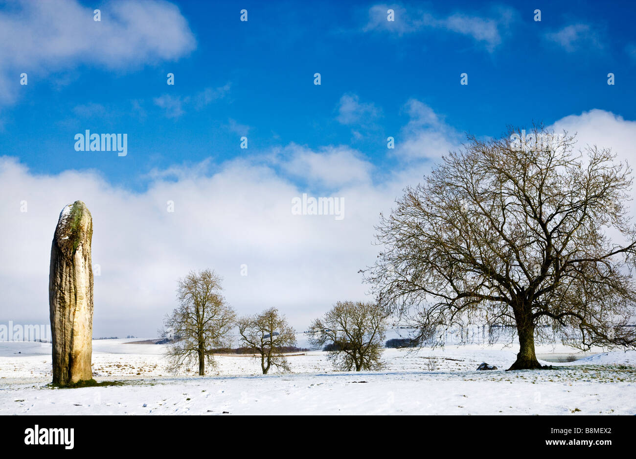 A snowy winter scene at Avebury in Wiltshire England UK Stock Photo