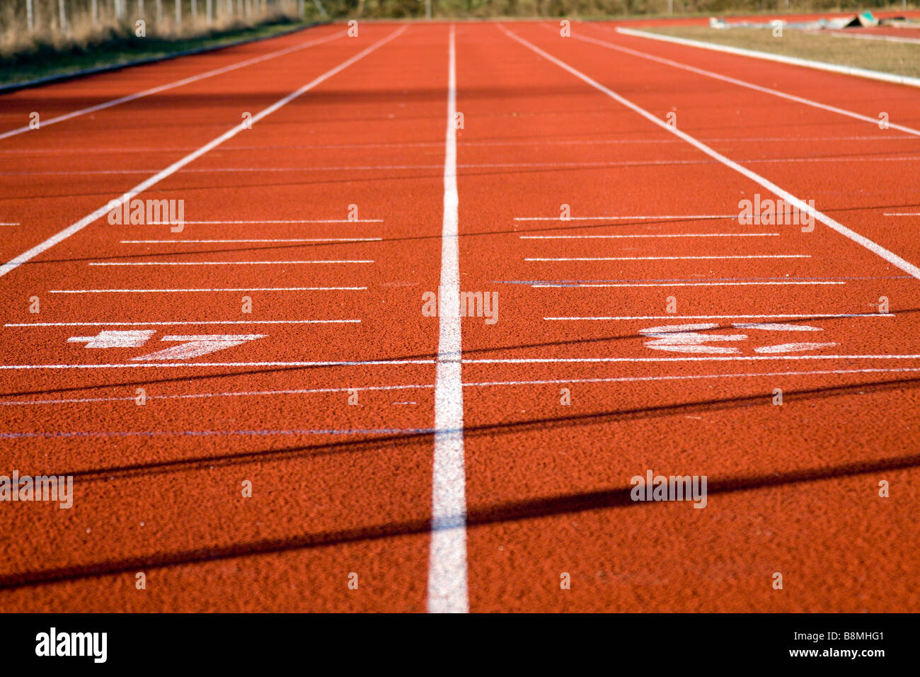 Lane numbers on running track Stock Photo Alamy