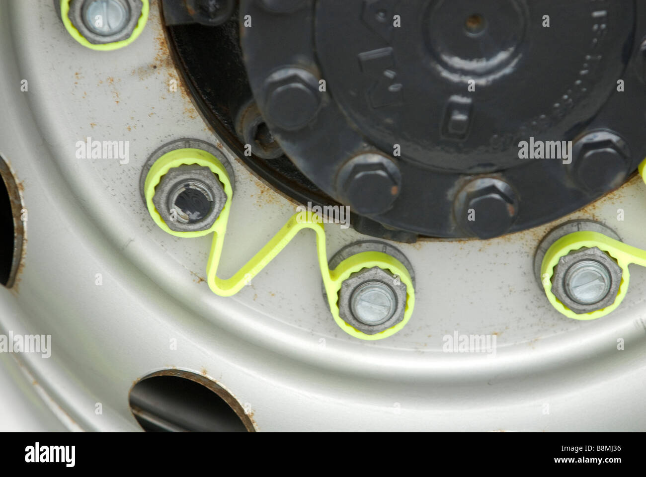 Loose wheel nut indicator tags on HGV Stock Photo Alamy