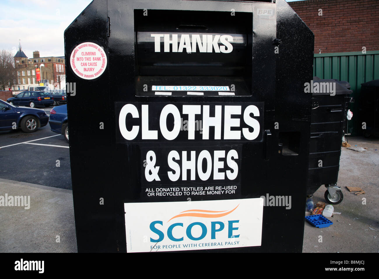 Clothes, shoes & textiles recycling bin, London Stock Photo Alamy