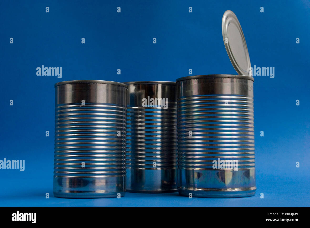 Tin cans empty waiting to be recycled Stock Photo