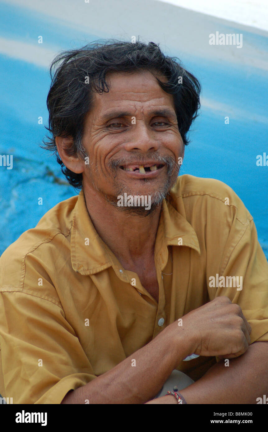A mulatto Asian man smiling outside a temple  in Thailand , portrait Stock Photo