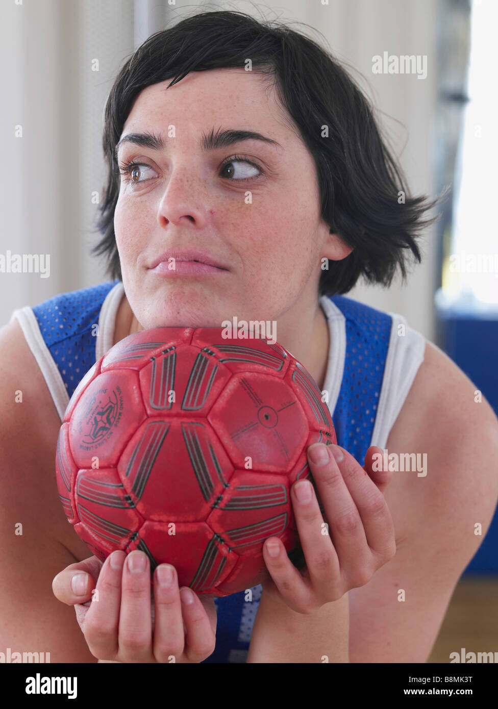 woman with red ball Stock Photo