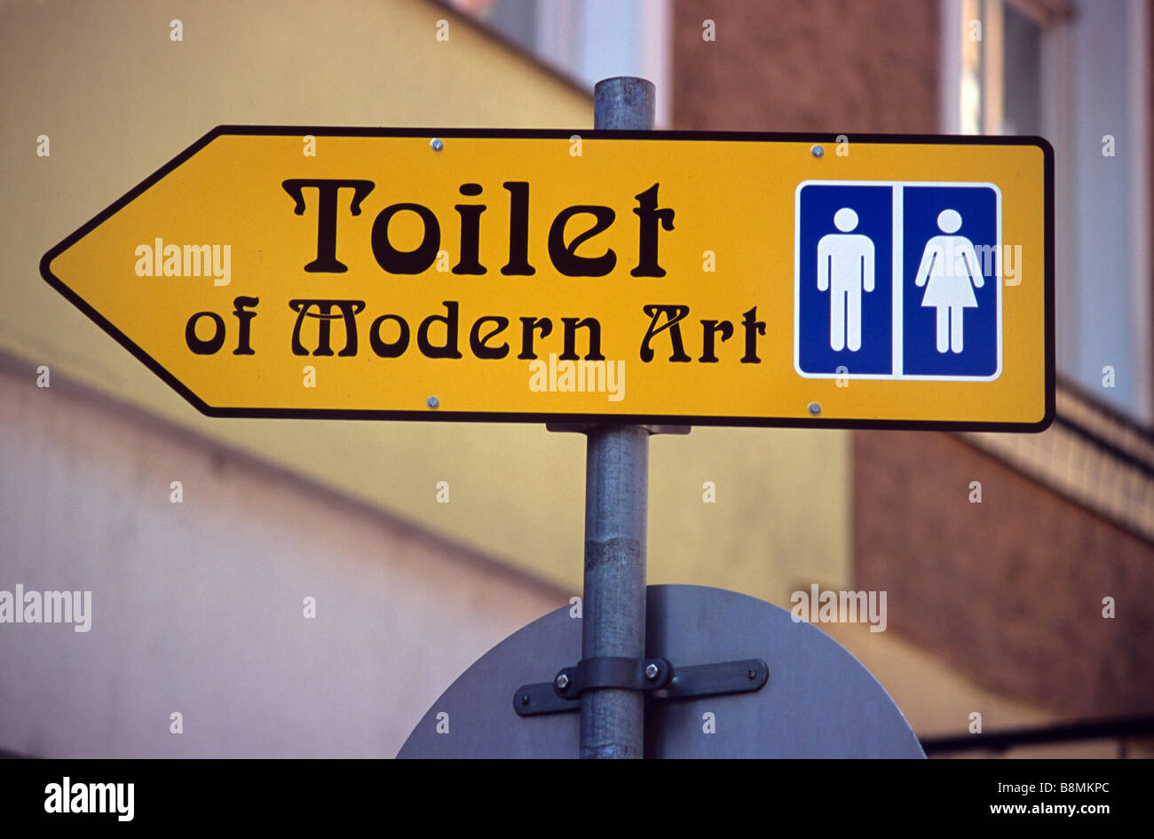 Sign to the Toilet of Modern Art by Freidensreich Hundertwasser, Vienna, Austria Stock Photo